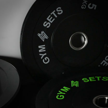 Disques de musculation olympiques colorés